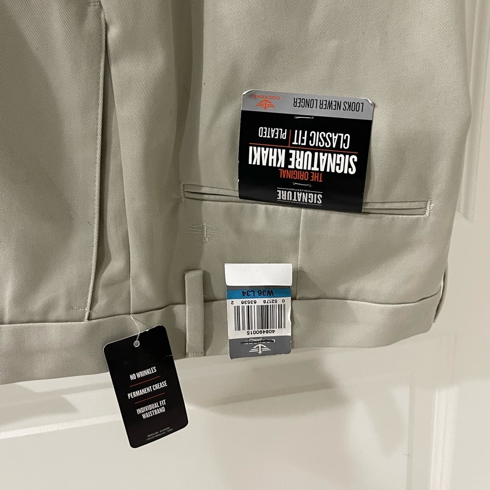 Dockers khaki pants Classic Fit 36x34.  New w/ tags. Signature; permanent crease